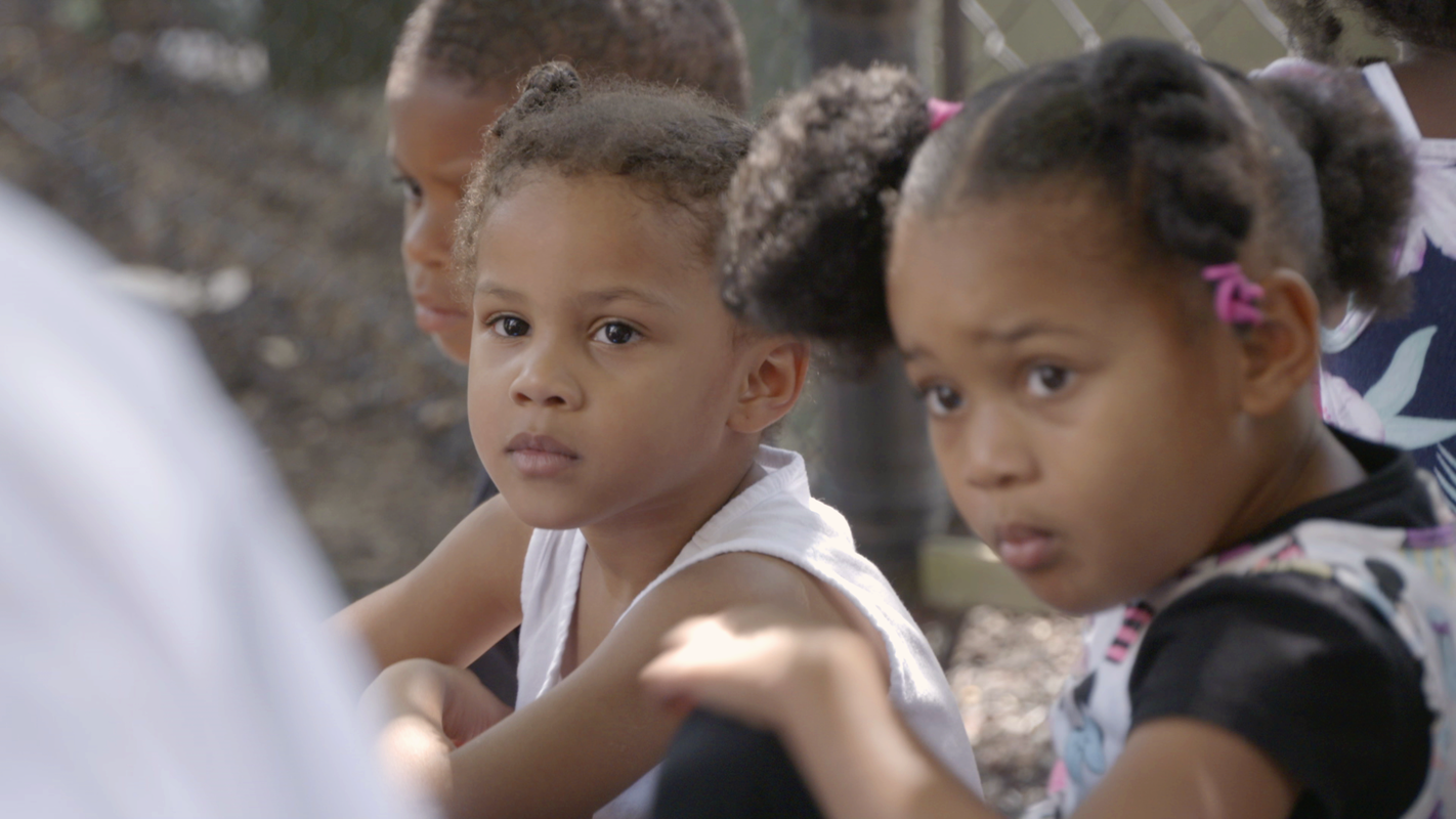 Children play outside at Sheltering Arms